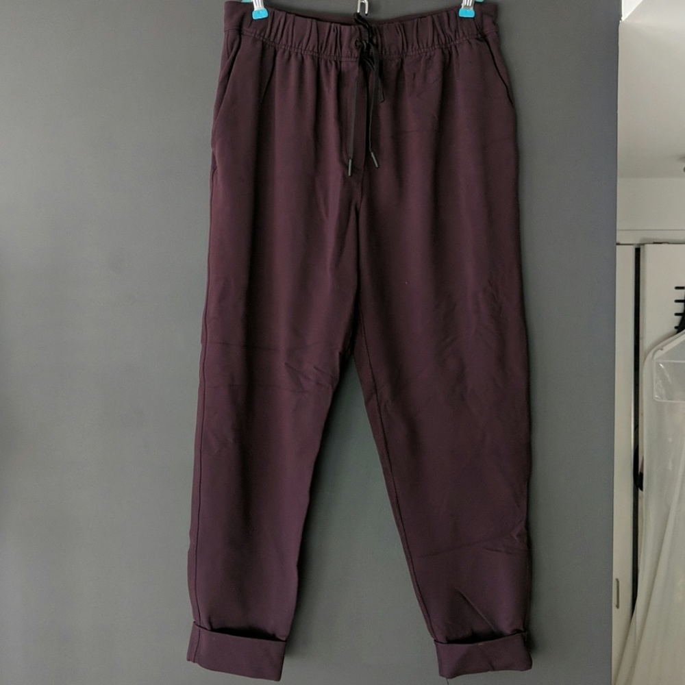 Lululemon Jet Crop pants in black cherry color